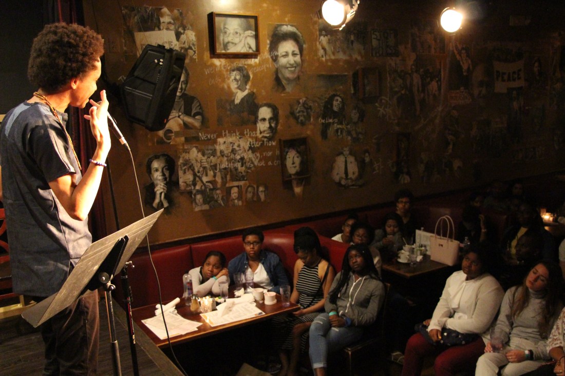 Clear featuring on stage in the Langston Room at Busboys and Poets